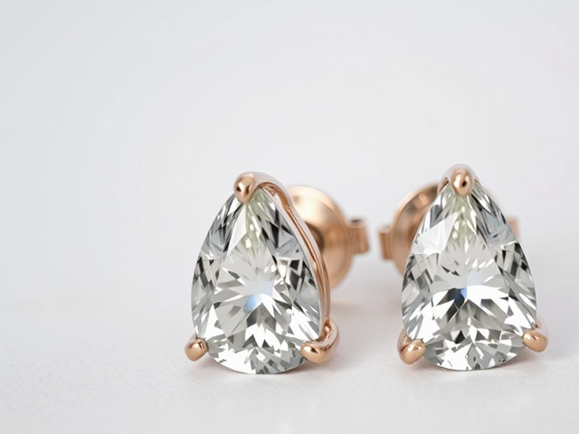 PEAR CUT DIAMOND STUD EARRINGS